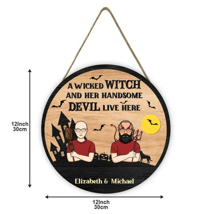 A Wicked Witch And Her Handsome Devil Live Here - Couple Personalized Custom Round Shaped Home Decor Witch Wood Sign - Halloween Gift For Witches, Husband Wife